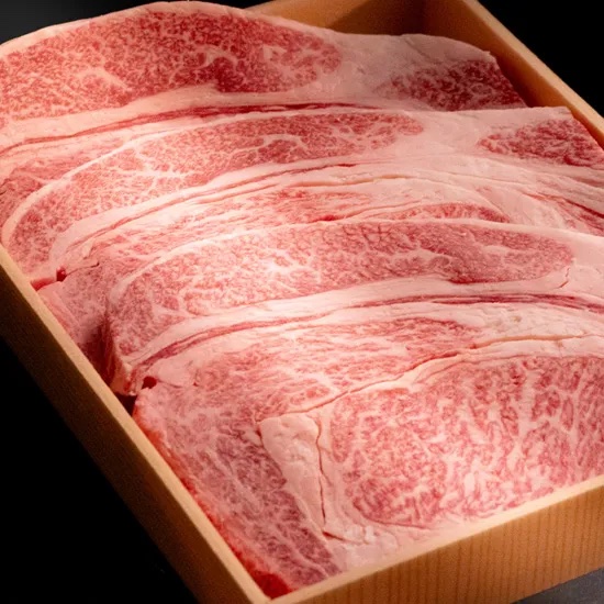 Sliced Miyazakigyu sirloin with dense marbling in a wooden box