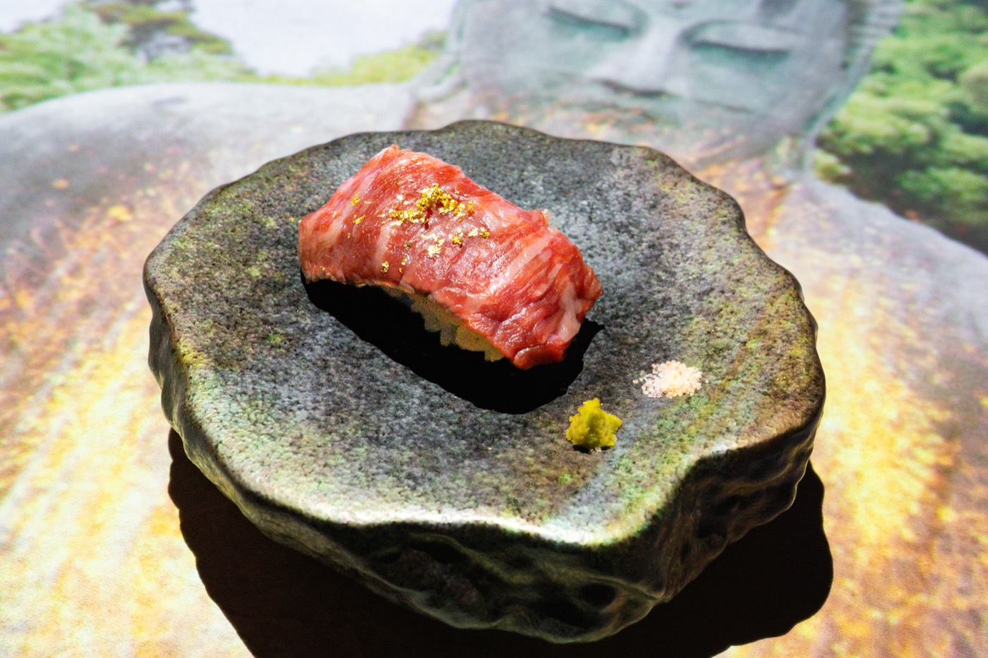 Wagyu nigiri with gold leaf, served at our omakase counter in Shinjuku